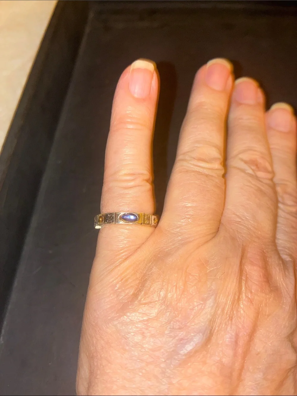 Gold-Tone Stretch Ring with Blue Cabochon Oval Stone
